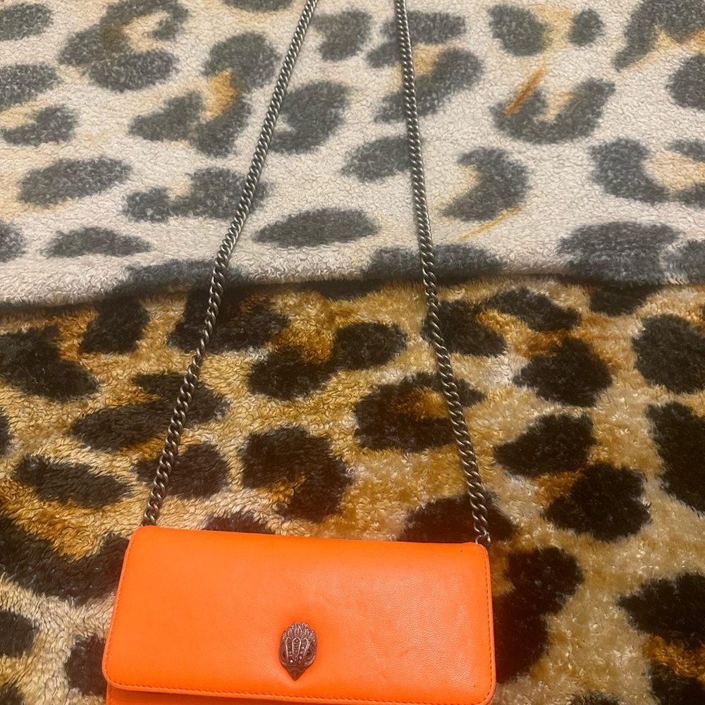 Orange Kurt Geiger wallet in a chain . Shows signs of loving 🥰 Beautiful & fun